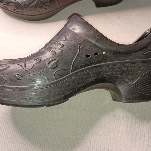 Elegance in Every Step: Embossed Floral Black Clogs by Dansko (#1,230) - Picture 2 of 6